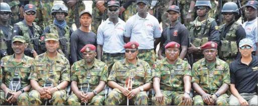  ??  ?? Chief of the Air Staff (CAS), Air Marshal Sadique Abubakar flanked by other senior officers and elements of the Special Forces