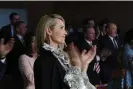  ?? Photograph: Rich Pedroncell­i/AP ?? Jennifer Siebel Newsom claps for her husband Governor Gavin Newsom after his inaugural State of the State address in Sacramento, California, in March 2022.