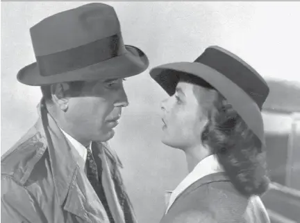 ?? WARNER BROS. PICTURES ?? Humphrey Bogart, left, and Ingrid Bergman starred in Casablanca, which debuted in theatres only a year after the United States had entered the Second World War. The classic 1942 movie is the subject of film historian Noah Isenberg’s new book.