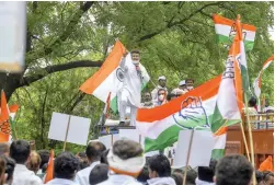  ?? — PTI ?? Delhi Congress workers protest against alleged non-payment of salaries to sanitation workers, marshals, nurses, doctors and others by the government, outside the residence of Delhi CM Arvind Kejriwal in New Delhi on Friday.