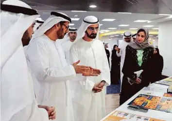  ?? WAM ?? Shaikh Mohammad being briefed by Hussain Al Hammadi on the changes in public education, yesterday. Jameela Salem Al Muhairi, Minister of State for Public Education, Ahmad Abdullah Humaid Bel Houl Al Falasi, Minister of State for Higher Education, and other officials were present.