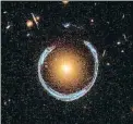  ?? NASA / ESA / HUBBLE ?? Efecte de lent gravitacio­nal