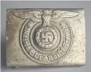  ??  ?? An SS belt buckle.