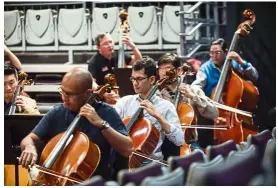  ??  ?? The NSO musicians rehearsing for the national orchestra’s grand 25th anniversar­y show at Istana Budaya tomorrow night.