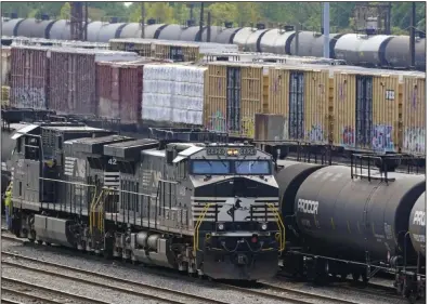  ?? (AP) ?? Norfolk Southern locomotive­s work last month at the Conway Terminal in Conway, Pa.