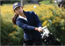  ?? JASON SCHMITT — MEDIANEWS GROUP, FILE ?? Rochester Adams senior Grace Wang finished third overall at the MHSAA Division 1girls golf finals to lead the Highlander­s to their first-ever state title in golf.