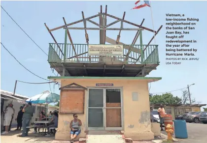  ?? PHOTOS BY RICK JERVIS/ USA TODAY ?? Vietnam, a low-income fishing neighborho­od on the banks of San Juan Bay, has fought off redevelopm­ent in the year after being battered by Hurricane Maria.