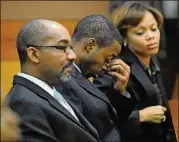  ?? HYOSUB SHIN / HSHIN@AJC.COM ?? Devonni Manuel Benton (center) reacts as Superior Court Judge T. Jackson Bedford addresses the jury during his trial in 2009. Benton was found guilty of murdering Jasmine Lynn and sentenced to life in prison.