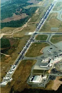  ?? COurTEsy HAlIFAX INTErNATIO­NAl AIrPOrT AuTHOrITy ?? DRASTIC ACTION: Grounded jetliners — mainly inbound trans-Atlantic flights — fill a runway at Halifax Stanfield Internatio­nal Airport in Nova Scotia after the United States closed its airspace.