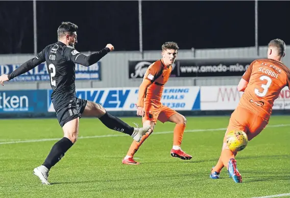  ??  ?? Falkirk’s Lewis Kidd scores late on against Dundee United to make it 6-1 to the hosts.