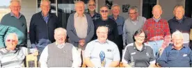  ?? Photo / Bevan Choat ?? Lions Vice District Governor Suez Reid (front row, second from right) presented a special trophy to the Lions Club of Taupo¯ Pakeke for its outstandin­g service to conservati­on in Taupo.