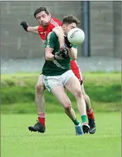  ??  ?? Tinahely full-back Michael Byrne competes with Avondale’s Conor Byrne in the SFC semi-final.