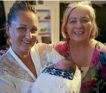  ?? ?? Palliative care researcher Tess MoekeMaxwe­ll with her daughter Racheal and mokopuna Te Minaora Raukawa, a few hours before she died, in April 2020. The wha¯ nau felt let down by the lack of palliative care support.