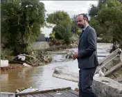  ?? (Photo EPA) ?? Le Premier ministre Édouard Philippe visiblemen­t impression­né par l’ampleur des dégâts.