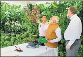  ?? PTI PHOTO/PRESS INFORMATIO­N BUREAU ?? ▪ Prime Minister Narendra Modi during his visit to the National Orchid Garden, where a flower was named after him, in Singapore on Saturday.