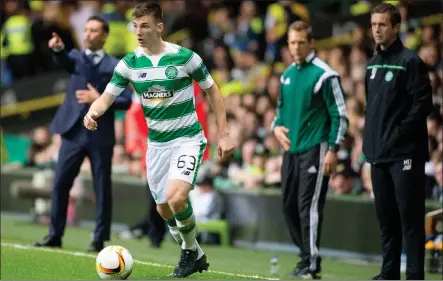  ??  ?? Flashback: Kieran Tierney in action for Celtic against Fenerbahce three years ago watched by then manager Ronny Deila. Left: Tierney in confident mood at yesterday’s press conference