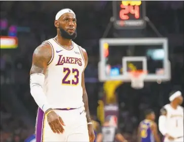  ?? Sean M. Haffey Getty Images ?? THE LAKERS’ LeBRON JAMES caused quite a stir after wading into the recent China/NBA controvers­y.