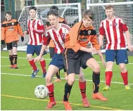  ??  ?? DUSC (tangerine) booked a last four spot in the U/19 Peter McAvoy Cup by beating St Andrews.