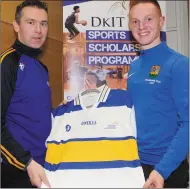  ??  ?? Oisin McConville presents Donal McKinney with his AllStar jersey.