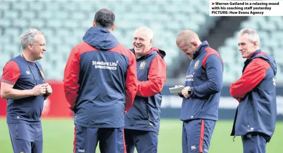  ??  ?? A: &gt; Warren Gatland in a relaxing mood with his coaching staff yesterday PICTURE: Huw Evans Agency