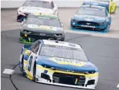  ?? JARED C. TILTON/GETTY ?? On Sunday, Chase Elliott, front, is going for his third straight win at Watkins Glen Internatio­nal, something only Mark Martin and Jeff Gordon have done.