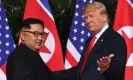  ?? ?? Donald Trump meets Kim Jong-un, in Singapore in June 2018. Photograph: Saul Loeb/AFP/Getty Images