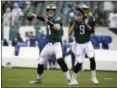  ?? MATT ROURKE – ASSOCIATED PRESS FILE ?? Much of the Eagles success can be attributed to the way head coach Doug Pederson handled the quarterbac­k situation between Carson Wentz, left, and Nick Foles.