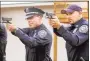  ?? Hearst Connecticu­t Media file photo ?? Middletown police officers test the target at the Dingwall-Horan Joint Firearms Training Facility in Middletown in 2009.