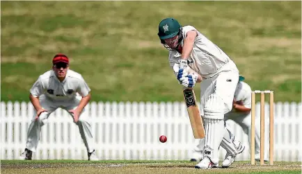  ?? PHOTO: PHOTOSPORT ?? Stags batsman Will Young plays defensivel­y against Canterbury on day two of their Plunket Shield clash in Nelson.