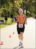  ?? VLADO ZAMECNIK/Special to the Herald ?? Alan Clarke of Penticton cruises along during the 10K race. Clarke was second overall in the men’s 60-69 age category in 1:08:14.