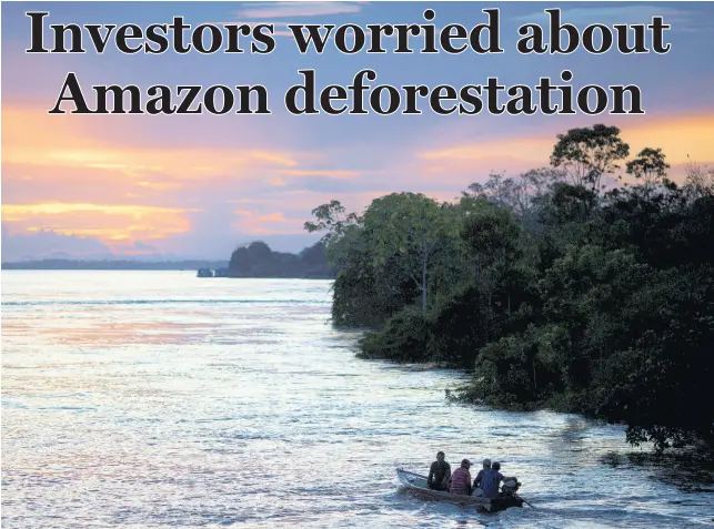  ?? AP ?? In this May 22, 2014 photo, a small boat navigates on the Solimoes River near Manaus, Brazil.