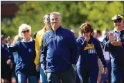  ?? TIM PHILLIS — FOR THE NEWS-HERALD ?? Chris Wenzler is all smiles during a ceremony in 2019honori­ng him as a member of John Carroll’s Athletic Hall of Fame.