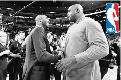  ??  ?? Kobe Bryant and Shaquille O’Neal shake hands at halftime after both of Bryant’s #8 and #24 Los Angeles Lakers jerseys are retired at Staples Center on December 18, 2017 in Los Angeles, California. - AFP photo