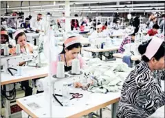  ?? POST STAFF ?? The volume of Cambodian garment, footwear and travel goods exports dipped 10 per cent in the first 10 months of 2020 over the correspond­ing period in the previous year.