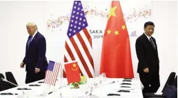  ??  ?? IN BETTER TIMES: Chinese President Xi Jinping (R) and US President Donald Trump