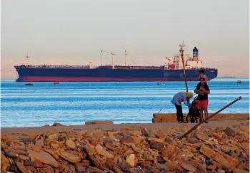  ?? ?? A container ship crosses the Gulf of Suez towards the Red
Sea before entering the Suez Canal in this photo. — Reuters