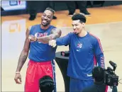  ?? MARK J. TERRILL — THE ASSOCIATED PRESS ?? Philadelph­ia’s Dwight Howard, left, and Danny Green, both of whom were on the Lakers last season, were given their championsh­ip rings before Thursday’s game at Staples Center.