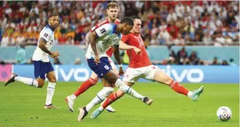  ?? (Reuters) ?? England’s Marcus Rashford scores against Wales during FIFA World Cup at the Ahmad Bin Ali Stadium yesterday.