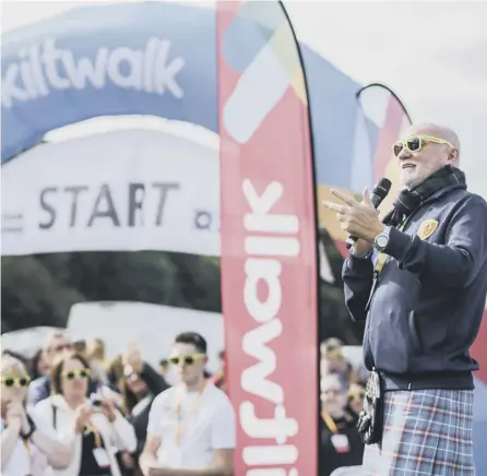  ??  ?? 0 Sir Tom Hunter gets the 2017 Edinburgh Kiltwalk under way