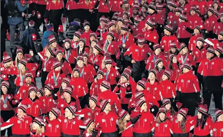  ?? CP PHOTO ?? Canadian athletes enter the stadium during the closing ceremonies at the 2018 Pyeongchan­g Olympic Winter Games on Sunday.