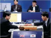 ?? CREDIT: GOOGLE / GETTY IMAGES ?? Profession­al Go player Lee Se- dol, right, places his first stone against Alphago.