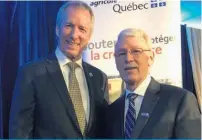  ??  ?? André Lamontagne, ministre de l’Agricultur­e, et Ernest Desrosiers, président-directeur général de La Financière agricole du Québec.