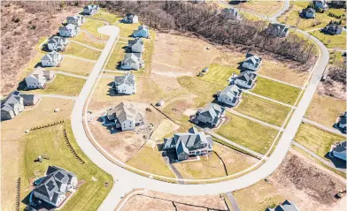  ?? MARKMIRKO/HARTFORD COURANT ?? Advocates of housing equity in Connecticu­t say the state must adopt new polices that ensure all towns bear the responsibi­lity of providing affordable housing. Above is the 58-unit Glastonbur­y Estates developmen­t.