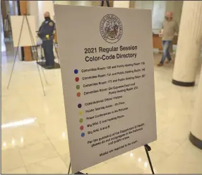  ?? (Arkansas Democrat-Gazette/Staton Breidentha­l) ?? The locations of committee rooms and holding areas are designated by color coding at the state Capitol on Friday. The House will have 78 Republican­s and 22 Democrats. The Senate will have 28 Republican­s and seven Democrats.