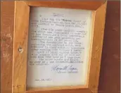  ??  ?? Items found in the circa-1909 Sears kit house developer Joel Bisaillon is renovating in Niskayuna include, from left, a “bride’s chest” that, according to the note at right, dates back to roughly 1843. At center is a 1902 Sears, Roebuck catalogue and a photo of the house.