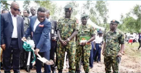  ??  ?? Cross River State Governor, Professor Ben Ayade, performing the groundbrea­king ceremony of the Nigerian Army Post Service Housing Estate in Ayade Mega City, Tinapa, Calabar...yesterday. With him are the state Deputy Governor, Professor Ivara Esu (first...