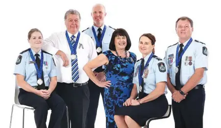  ?? PHOTO: AAP/CLAUDIA BAXTER ?? HONOURS: Pride of Australia medal recipients (from left) Constable Brittany Poulton, Brett Forte’s dad Stu Forte, Acting Sergeant Scott Hill, Brett’s mum Heather Forte, Senior Constable Catherine Nielsen and Senior Constable Stephen Barlow.