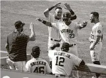  ?? Karen Warren / Staff photograph­er ?? The Astros’ offensive resurgence can be traced to the fifth inning of their Game 3 loss to the Athletics in the ALDS.