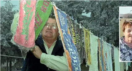  ??  ?? A 2001 photo of Tom Rutherford, the previous owner of Blacks Hotel in Ophir, checking on the bar towels when a hoar frost was descending.