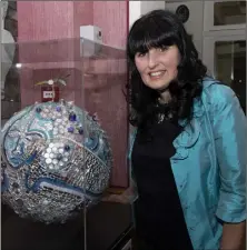  ??  ?? Artist Helen McLean with her globe.